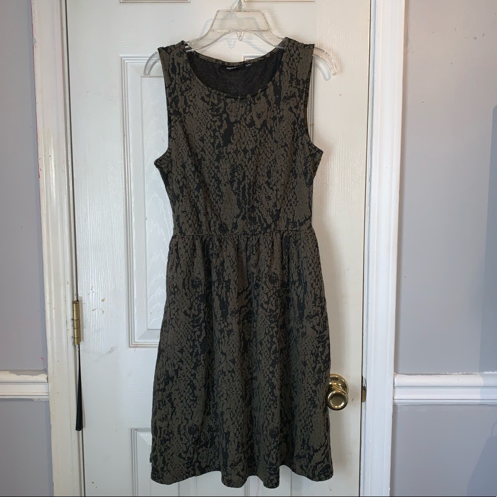 Black and green snakeskin pattered dress.